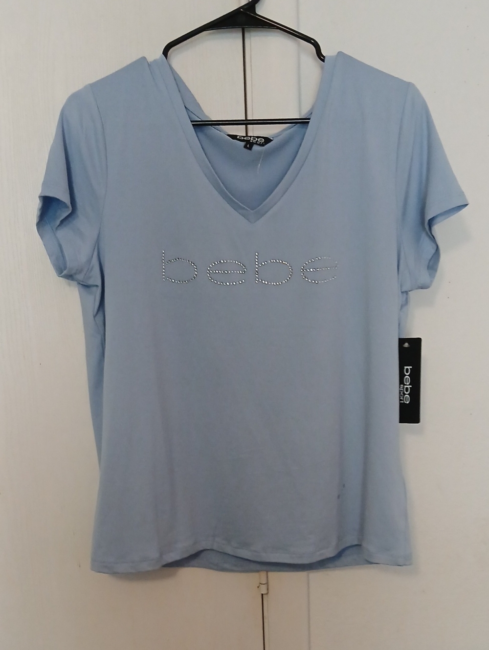 bebe Light Blue V-Neck Tee with Crystal Logo